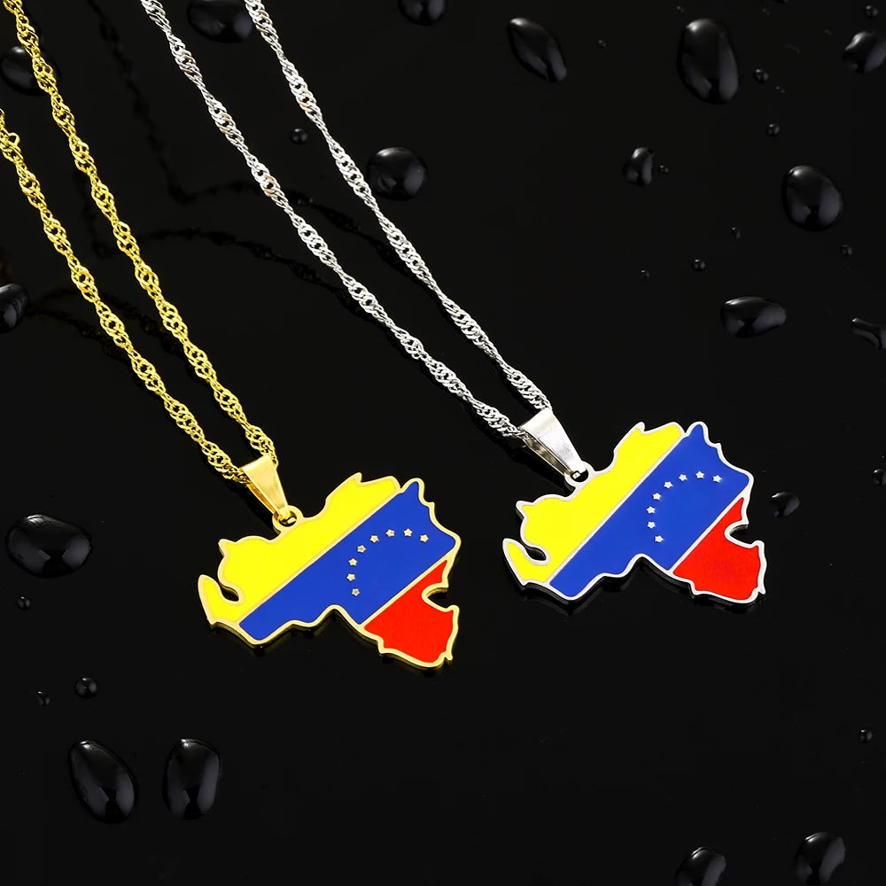 Two Venezuela map pendant necklaces in gold and silver tones featuring the Venezuelan flag design with seven stars, displayed on a black background with bold link chains.